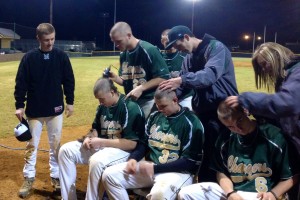 BASEBALL PLAYERS shaved their heads at the beginning of the season to raise money for cancer research. Photo courtesy of Lori Golden