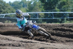 Junior Kyle Jones leans into a turn mid-race at the Pro Shootout at Hog Heaven in Godwin, N.C. Photo courtesy of Tammie Jones