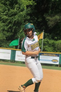 Senior Payton Springle eyes the pitcher as she prepares to run. Hannah Gail Shepherd/The Omniscient