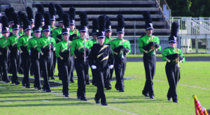 Not To Toot Their Own Horns: Marching band sets new standard of excellence